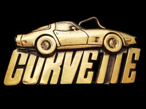 LL25172 *NOS* VINTAGE 1980 CUT-OUT **1970s CORVETTE** SOLID BRASS CAR BUCKLE