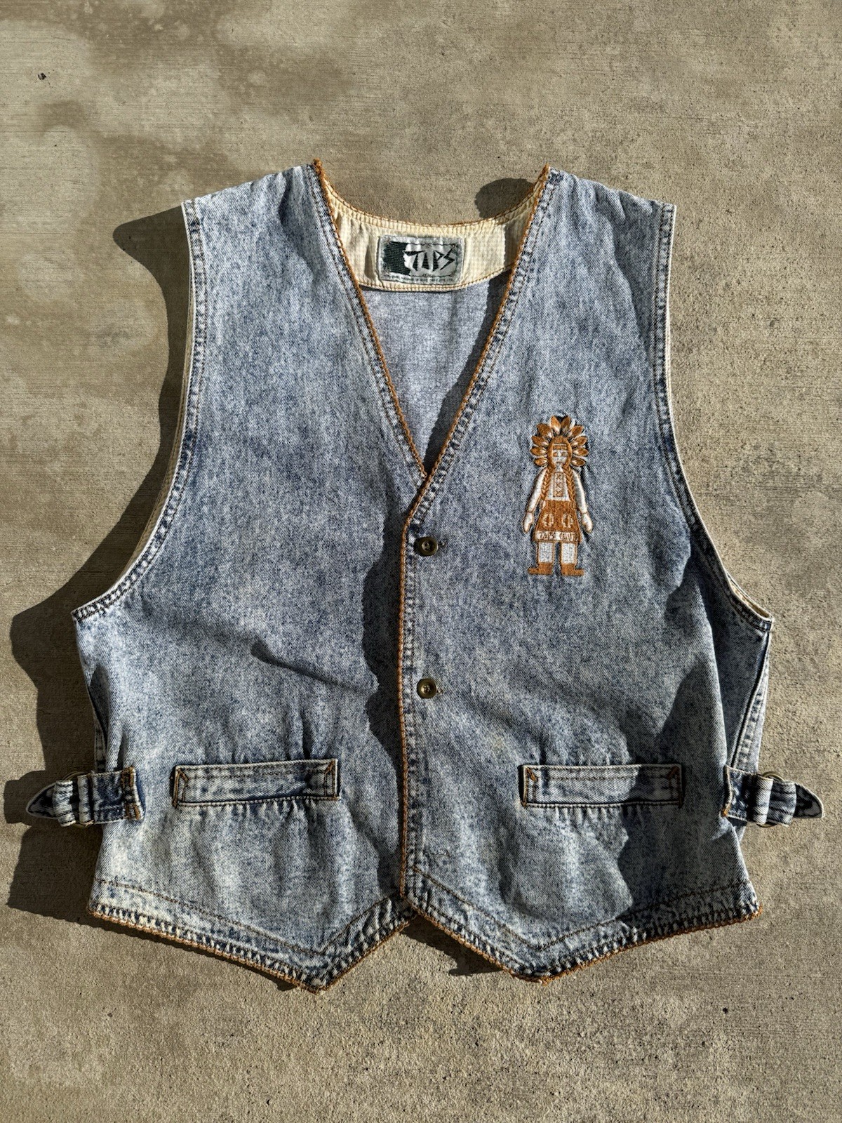 Vintage 80’s / 90’s acid-wash denim vest with embroidered Aztec figure by Tips