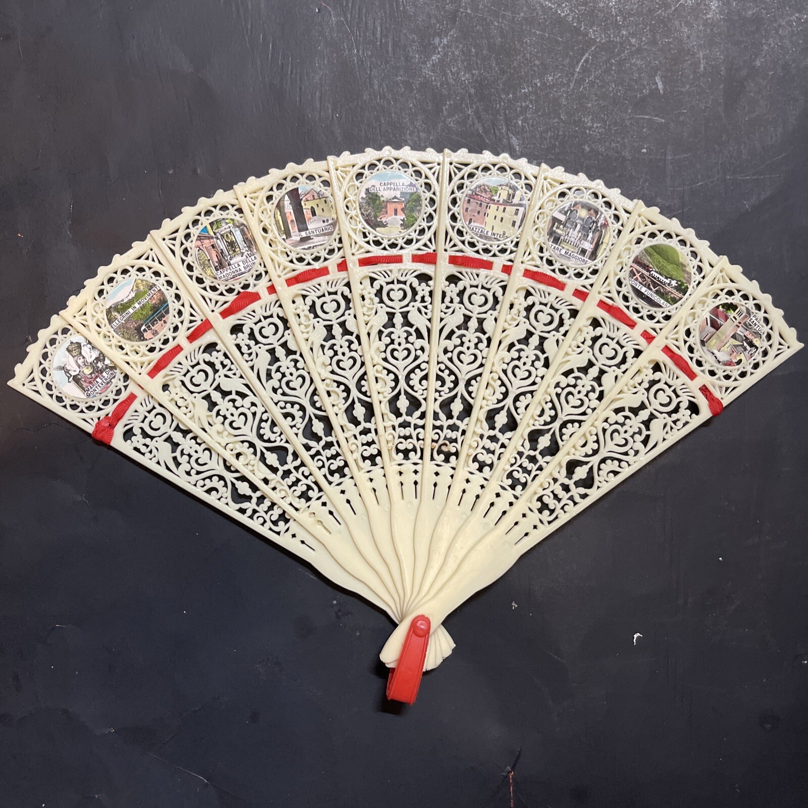 Vintage 50’s Souvenir Celluloid Fan 7″ 9 Pierced Panels Connected W/red Cordage