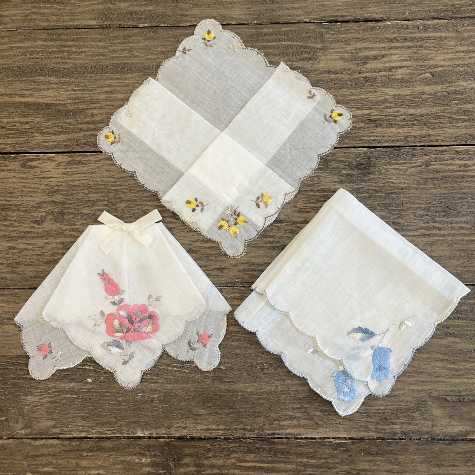 3 NEW Vtg Hankies Embroidered Floral On White Folded 4 Corners Pink Blue Yellow