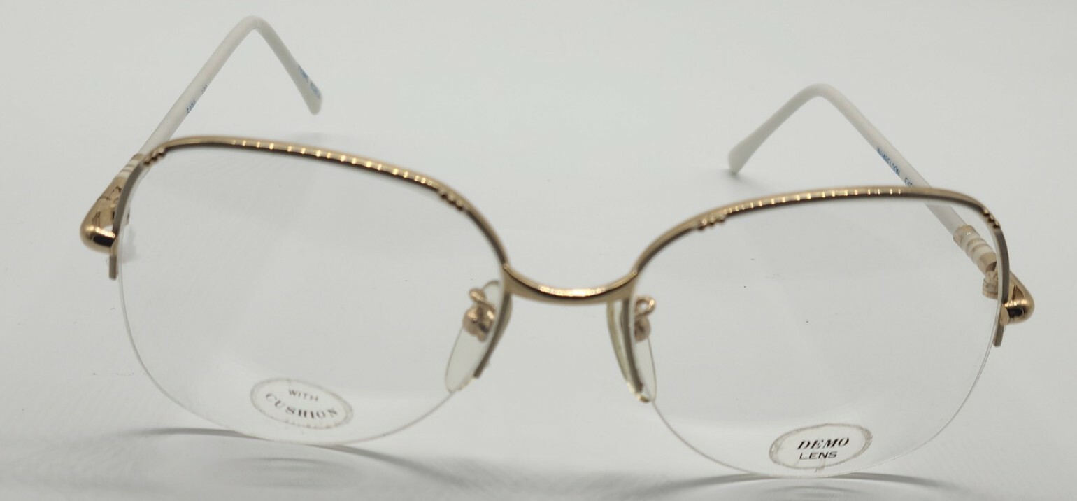 WIMBLEDON EYEWEAR 6400 54-18- 130. GOLD/WHITE. $149.50.