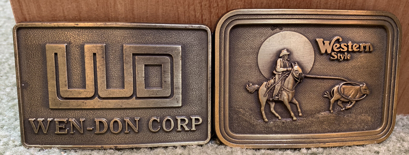 Two 3 1/2” 1980’s Western Style Cowboy & Wen-don Trucking Brass Belt Buckle Lot