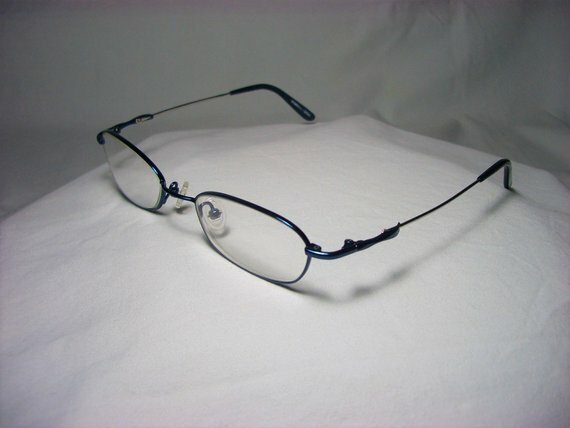 Scorpio eyeglasses 22 kt white gold plated Titanium round oval square frames