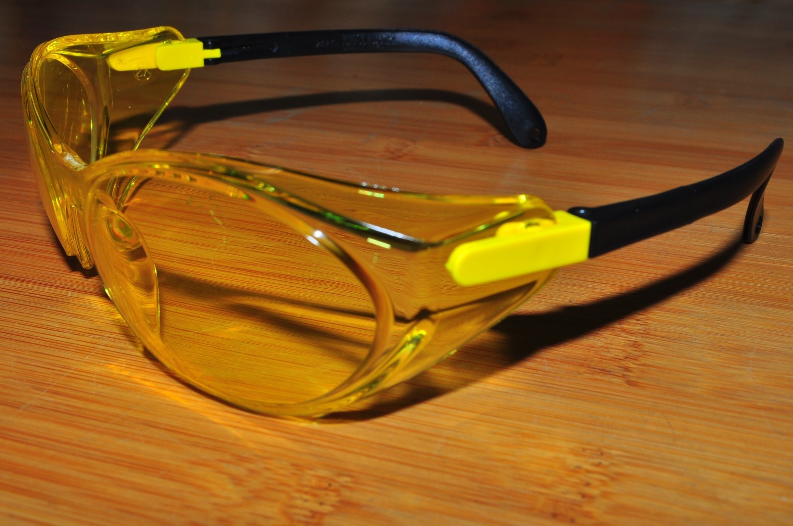 Uvex Eyewear Safety Sun Glasses Bandido S1722 Hot Yell Black Frame Amber lens
