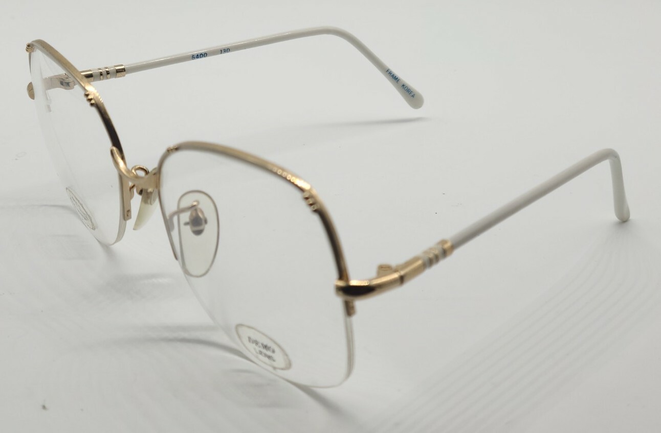 WIMBLEDON EYEWEAR 6400 54-18- 130. GOLD/WHITE. $149.50.