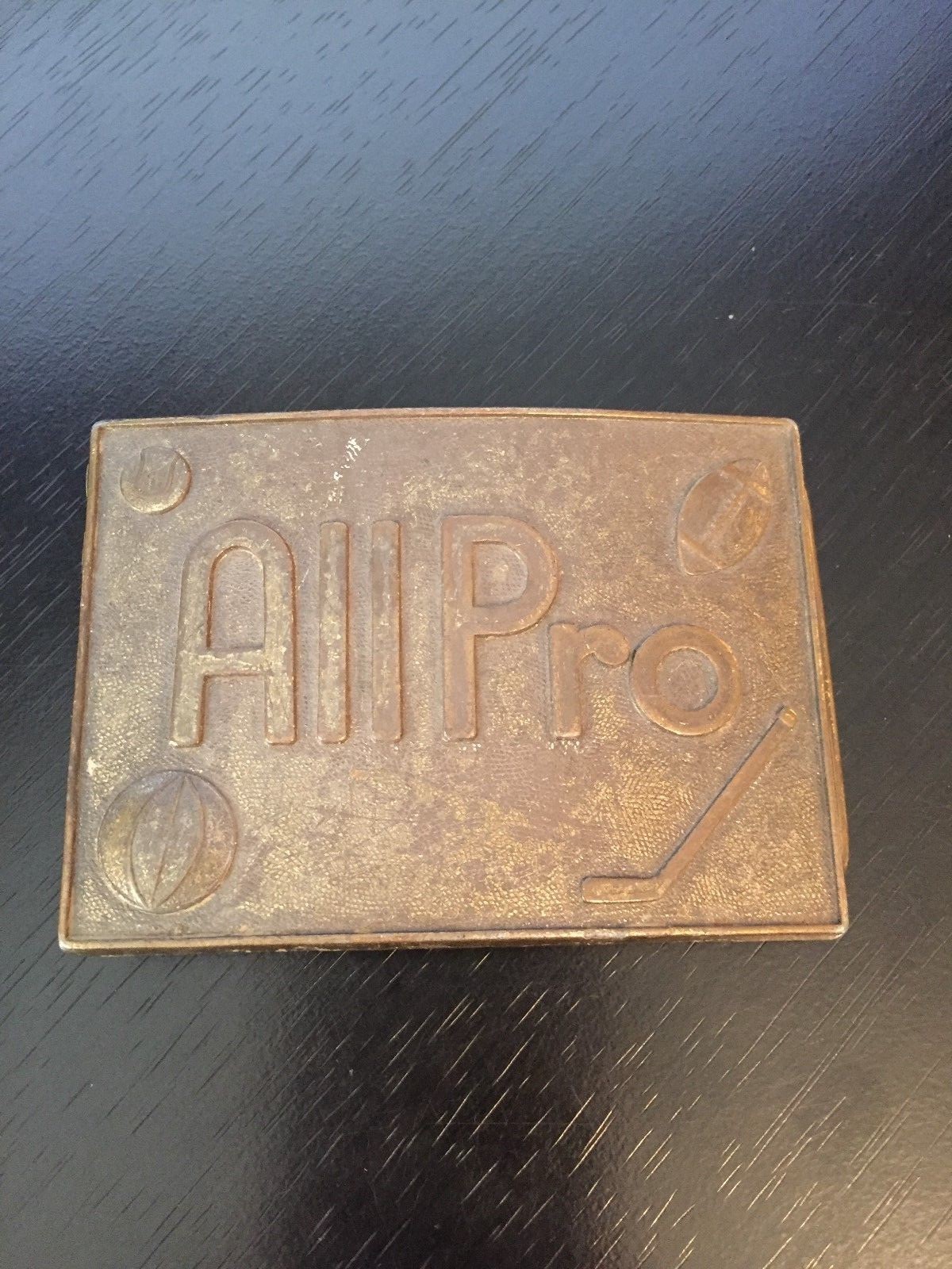 All Pro Belt Buckle Shows Basketball Football Hockey Stick and Baseball