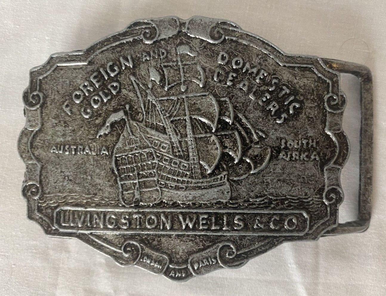 Vtg Livingston Wells Co. Belt Buckle Foreign Gold Domestic Dealers Sailing Ship