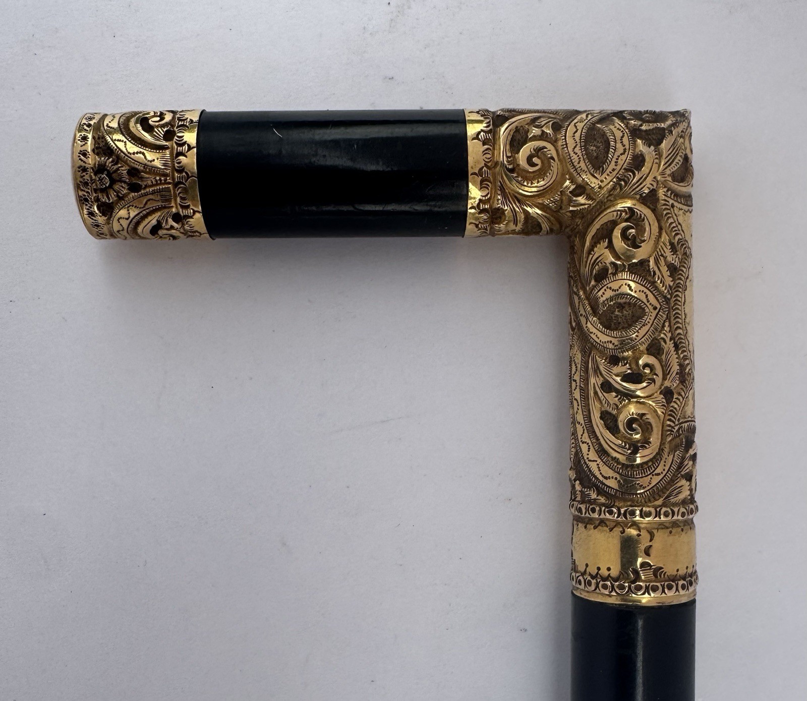 A VERY FINE ANTIQUE HAND CHASED 14K GOLD EBONY MASONIC CANE WALKING STICK